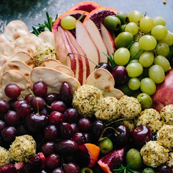 Tasting plate of food including processed and fresh items