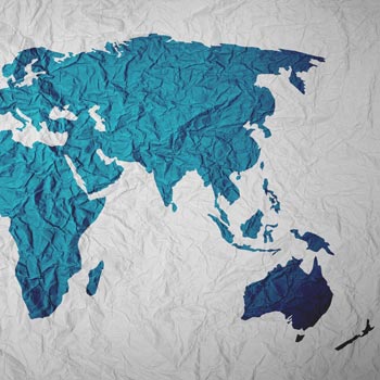 Paper world map showing Europe, Africa, Asia and Oceania